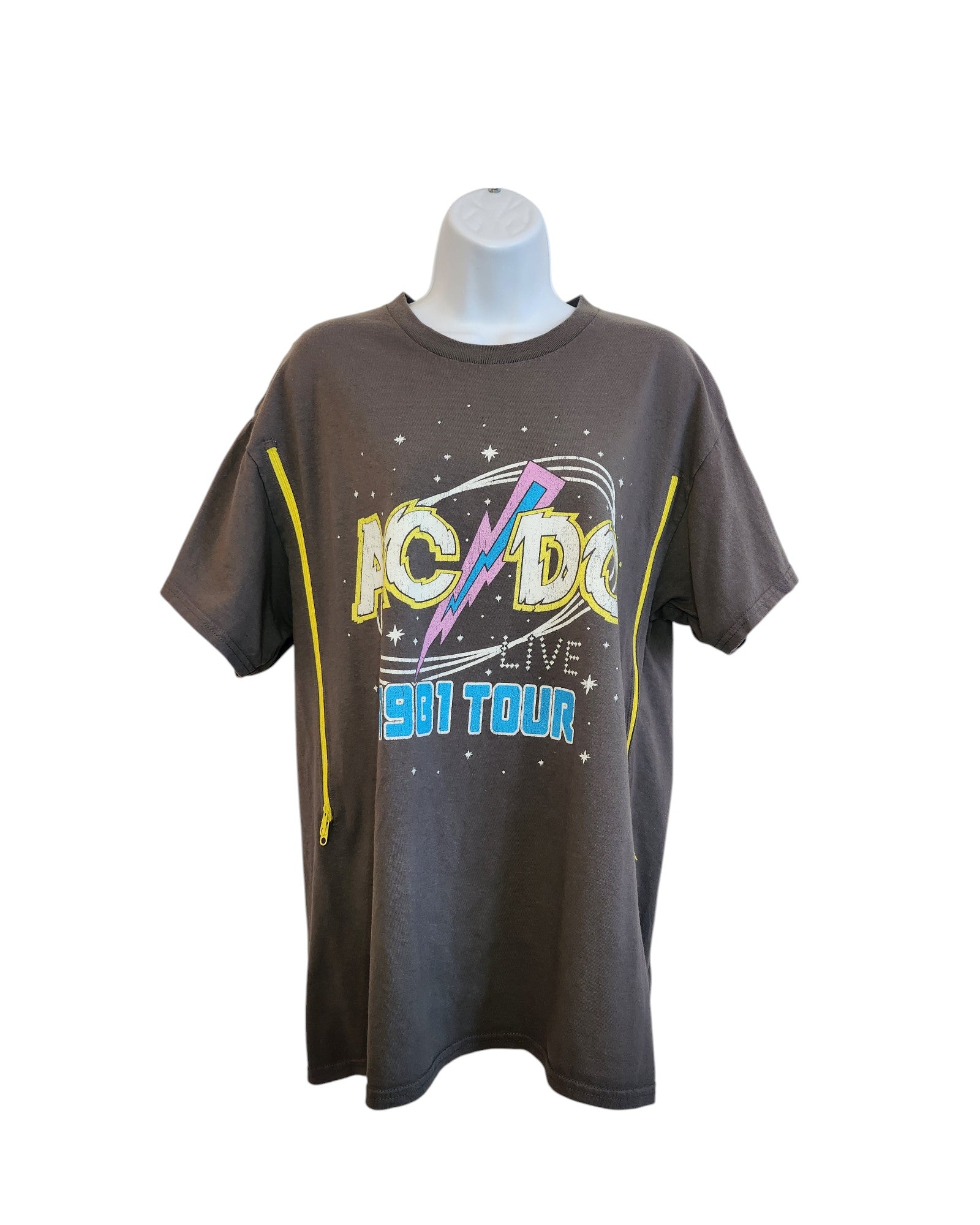 A mannequin displays an upcycled XL Upcycled Breastfeeding & Pumping Grey AC DC Tour t-shirt by touched out mama, featuring a vintage-style dark gray design with a yellow lightning bolt and vibrant text, breathing new life into preloved clothing.