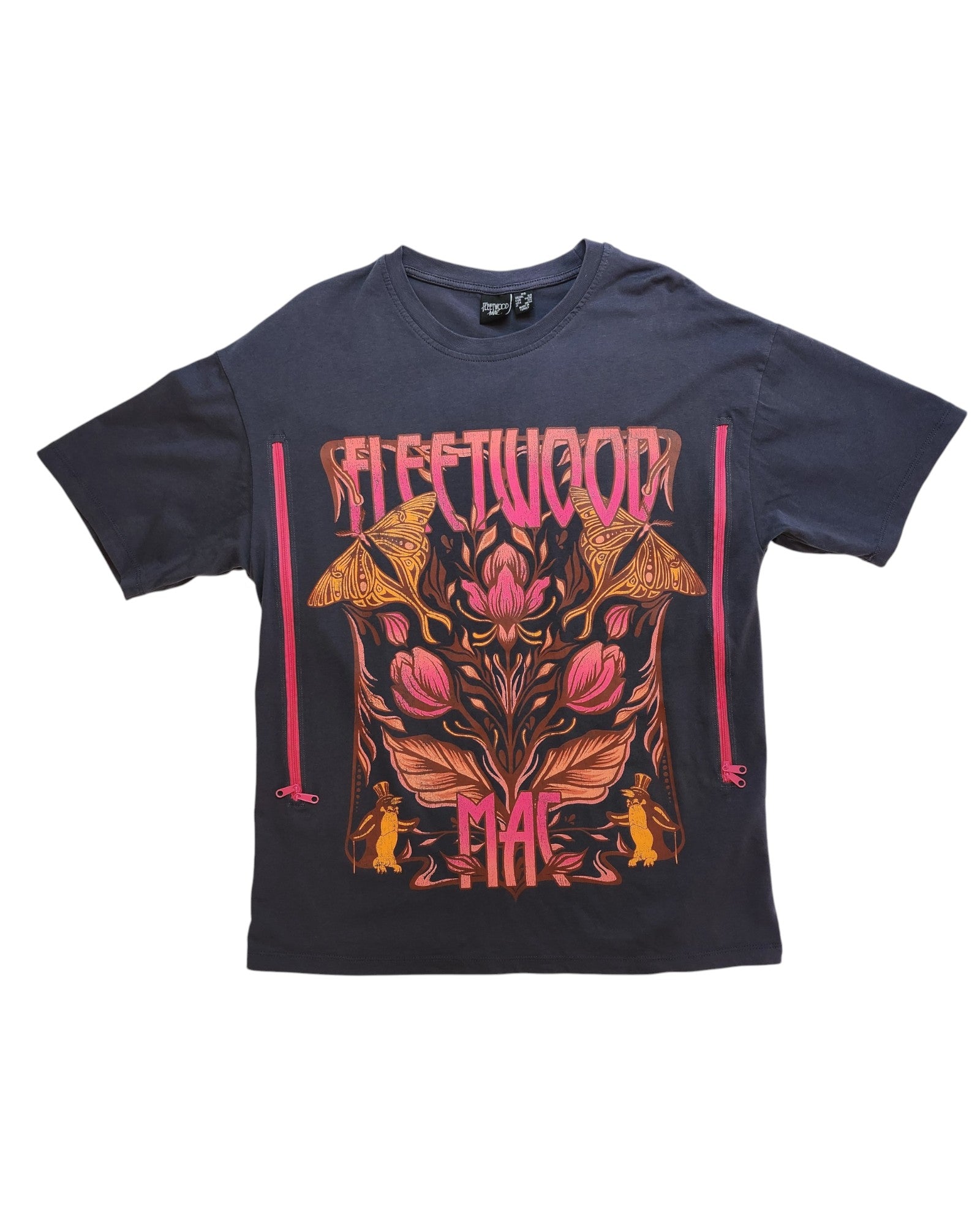 The touched out mama Upcycled Breastfeeding & Pumping Fleetwood Mac Floral t-shirt (XS) features a vibrant floral and mushroom graphic with the band name, all crafted from preloved clothing for a unique, eco-friendly style.