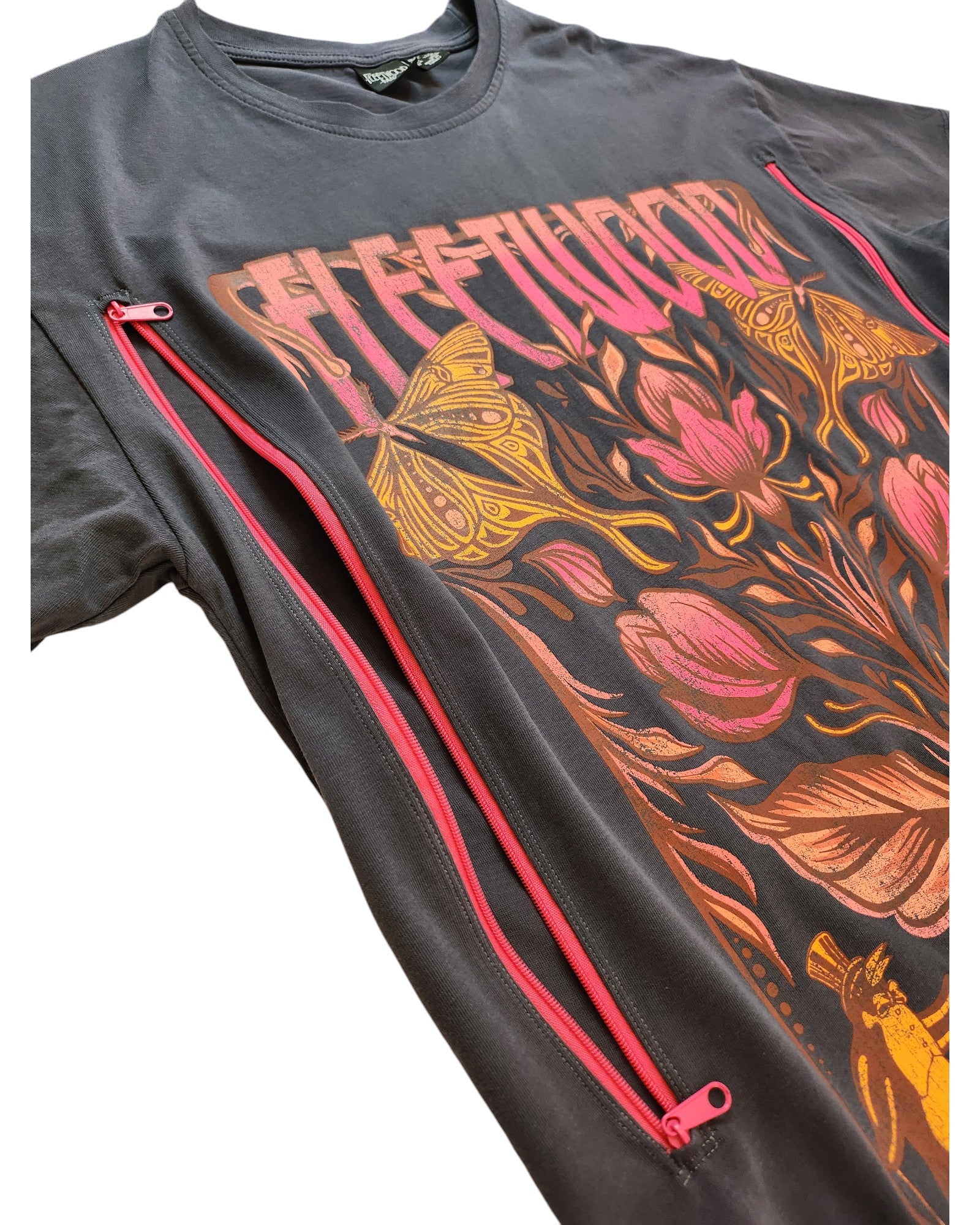 The Upcycled Breastfeeding & Pumping Fleetwood Mac Floral t-shirt XS by touched out mama features a colorful butterfly and flower design with Fleetwood text, black fabric, red zippers for nursing access, and adds unique flair to any wardrobe.
