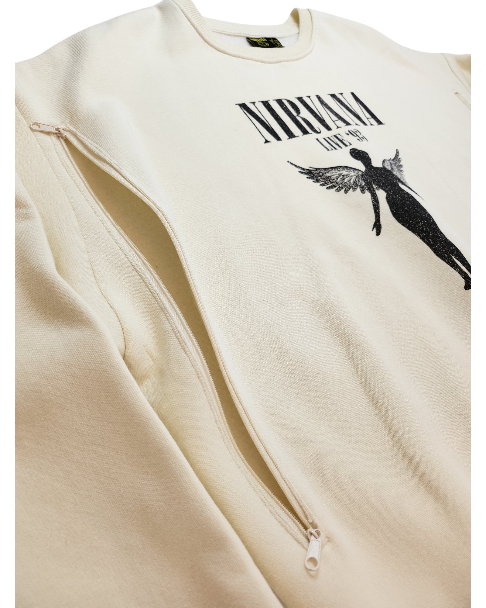 The touched out mama Upcycled Breastfeeding (Nursing) & Pumping Cream Nirvana Sweatshirt L features a cream color with the word Nirvana and an angel image. Designed with zippers on the shoulders, it exemplifies affordable eco-friendly fashion.