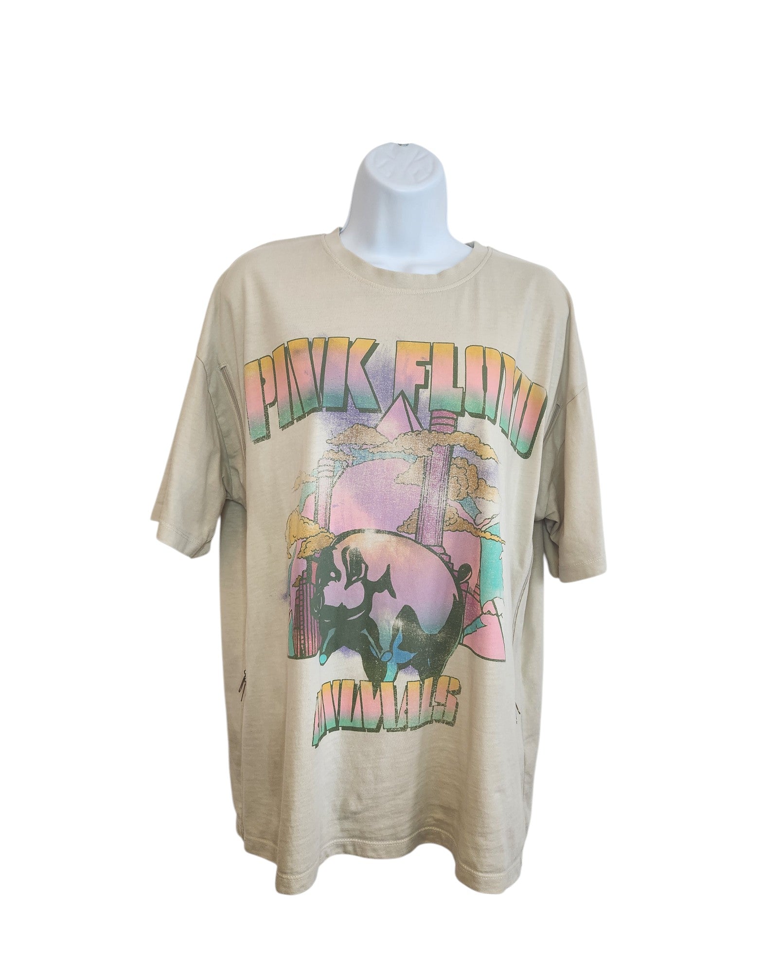 A cream Pink Floyd t-shirt by Primark (size S, UK10/12), upcycled for breastfeeding and pumping, is shown on a mannequin. It features bold PINK FLOYD and ANIMALS text with a colorful pig and factory graphic.