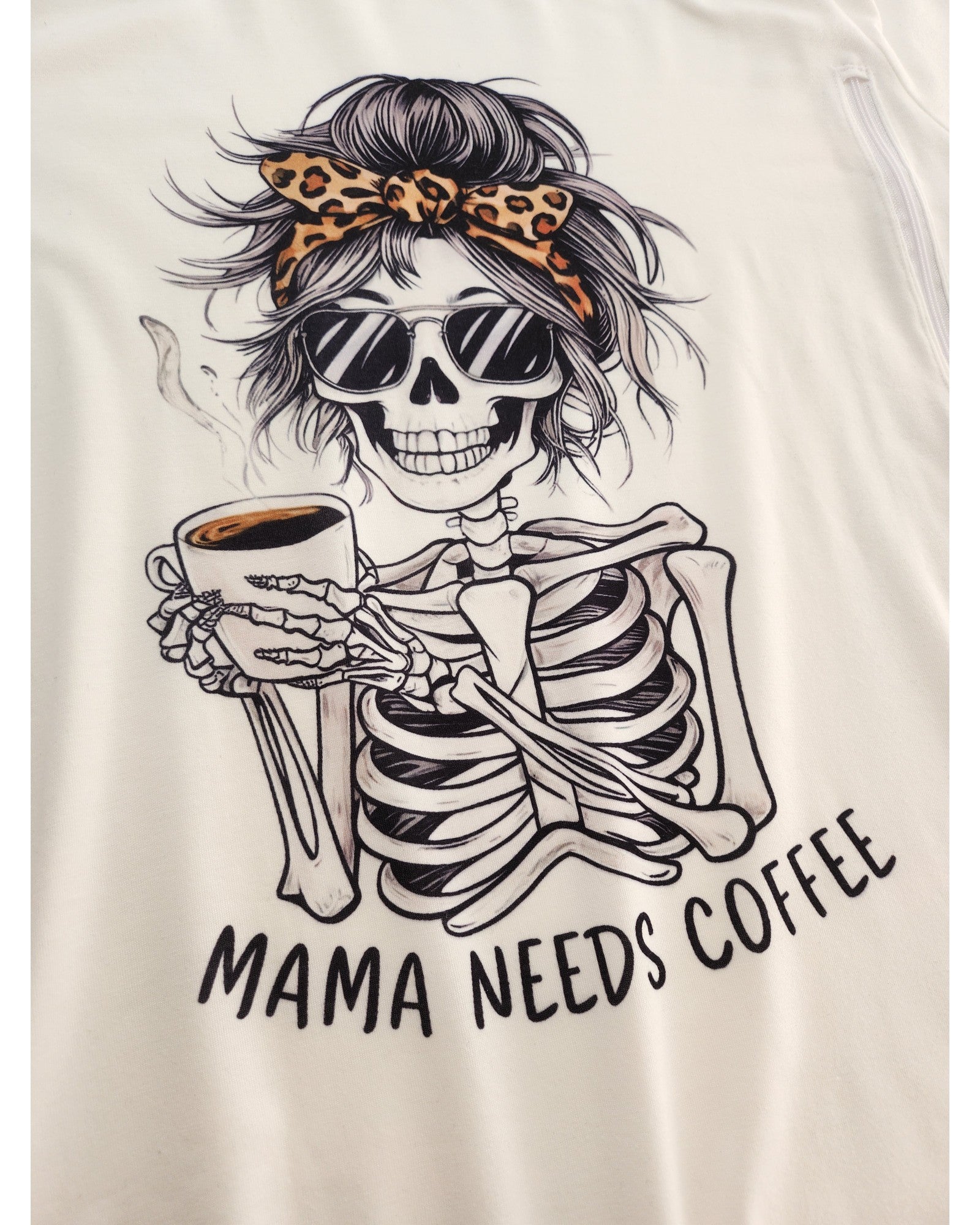 A graphic of a smiling skeleton with sunglasses and cheetah-print headband holds coffee, with MAMA NEEDS COFFEE below—featured on the Upcycled Breastfeeding & Pumping Mama Coffee t-shirt (XXL), perfect for eco-friendly style lovers.