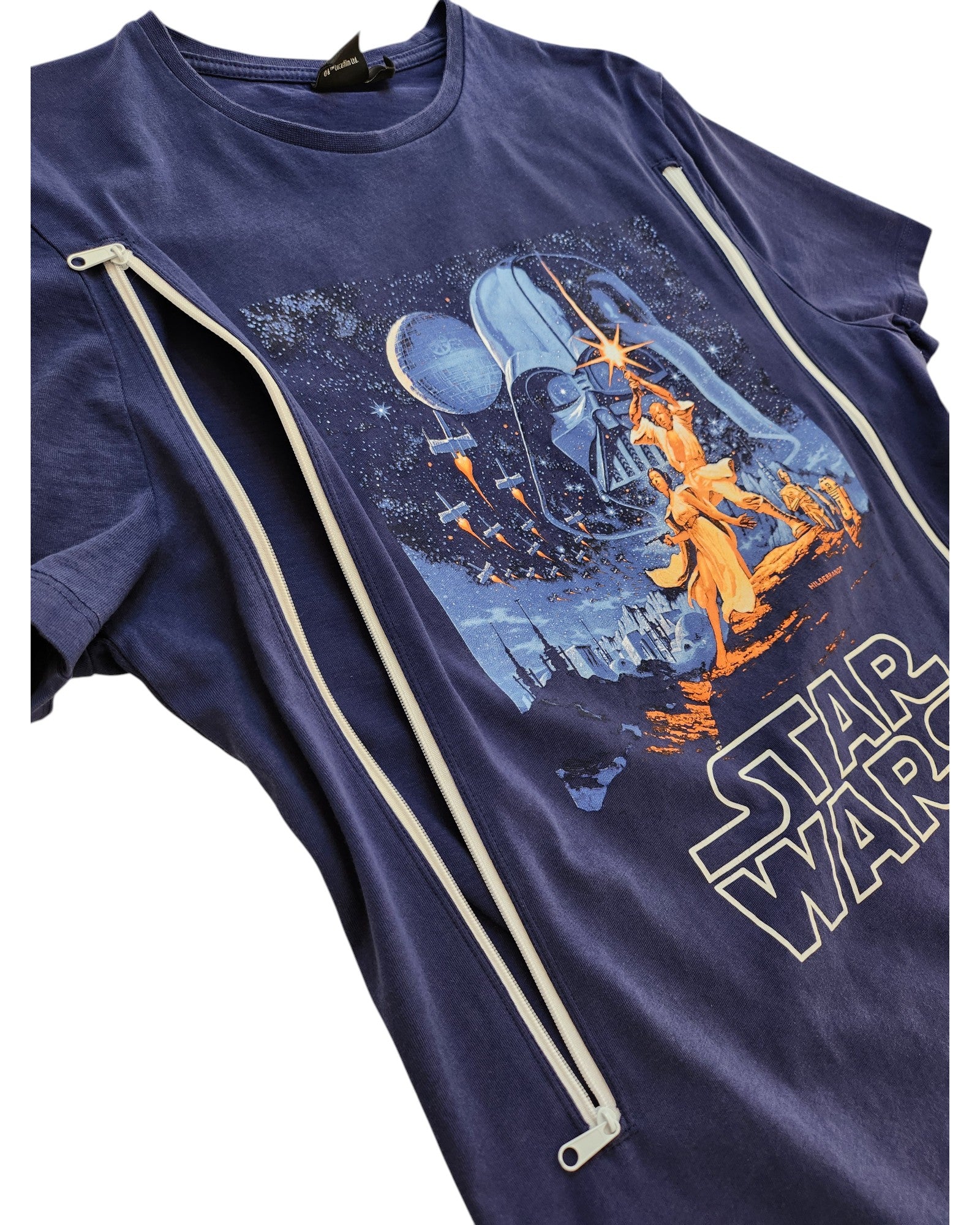 The Primark Upcycled Breastfeeding Navy Blue Star Wars t-shirt (M) features a classic movie poster print and two diagonal white zippers on the front, offering a stylish and convenient option for nursing or pumping.