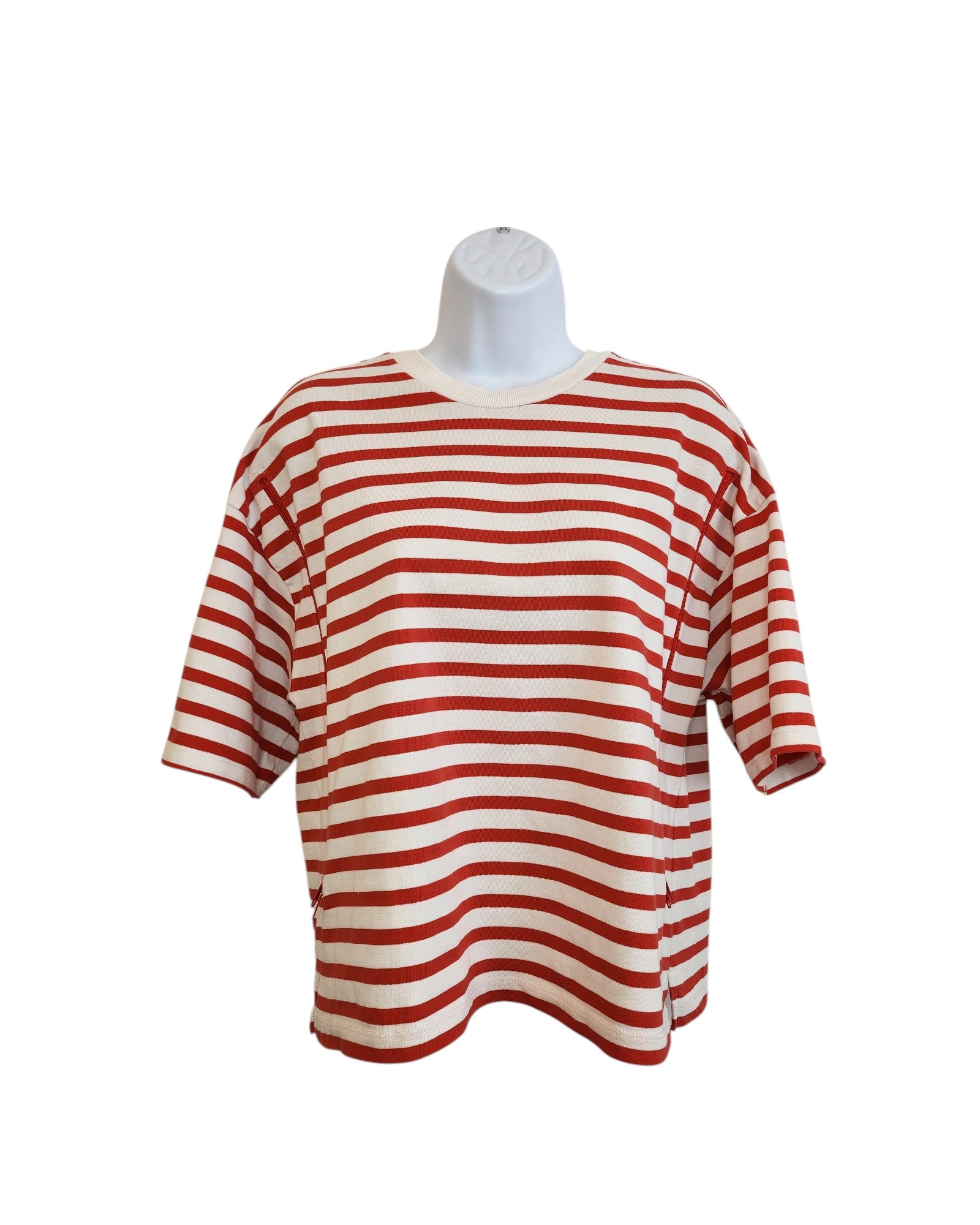 The Tu Upcycled Breastfeeding & Pumping T-shirt UK14 features red and white stripes, a short-sleeved loose fit, and is crafted from preloved clothing. Displayed on a white mannequin torso against a plain background.