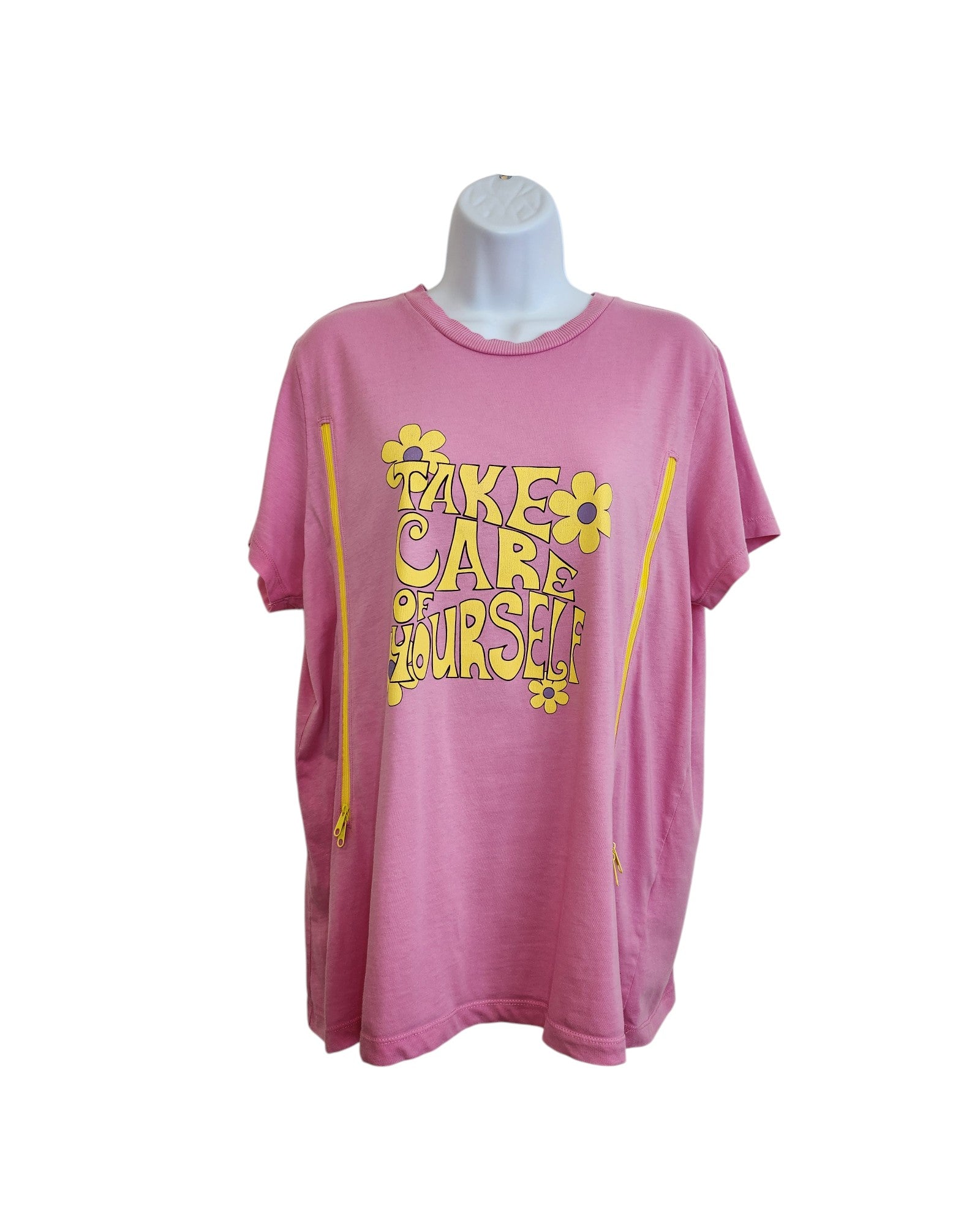 The Primark Upcycled Breastfeeding & Pumping Pink Take Care t-shirt (L, UK14/16) features Take Care of Yourself in bold yellow with floral designs, made from eco-friendly materials for a mindful touch.