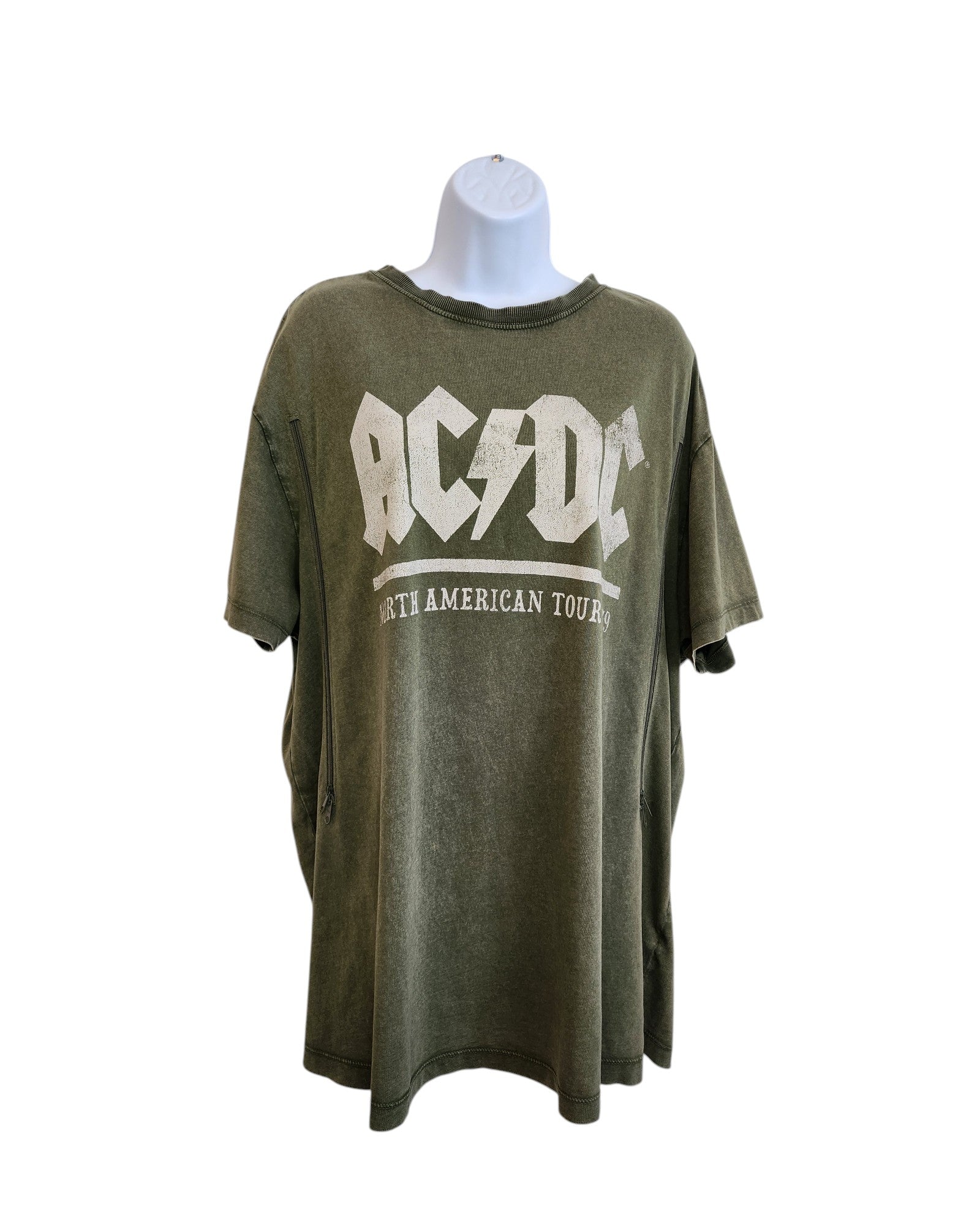 A khaki Upcycled Breastfeeding & Pumping AC/DC t-shirt by New Look (UK16), made from eco-friendly materials, displayed on a mannequin and featuring the AC/DC logo and North American Tour in bold white letters on the front.