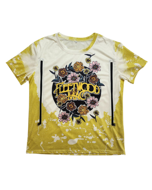 An upcycled lime Fleetwood Mac nursing & pumping T-shirt (XL) features the band logo with colorful flowers and leaves in the center for an eco-friendly, stylish look. Brand unknown.