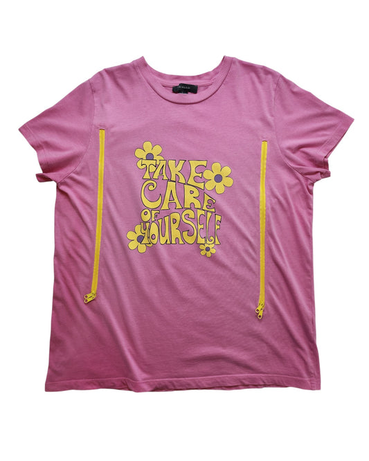 The Primark Upcycled Breastfeeding & Pumping Pink Take Care t-shirt (L, UK14/16) features eco-friendly fabric, yellow side zippers, Take Care of Yourself in bold yellow letters, and yellow flower designs on the front.