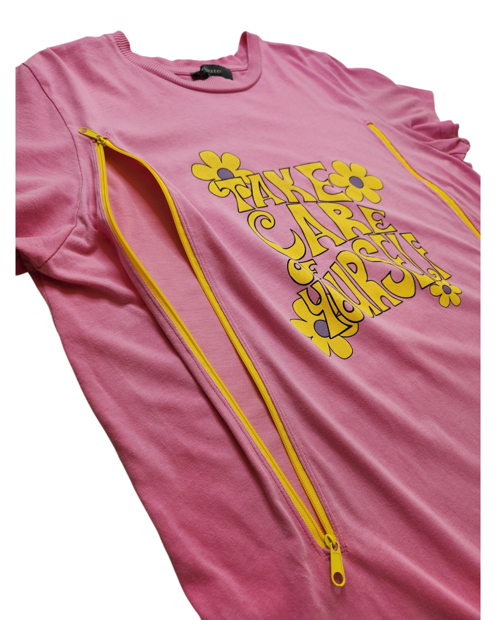 The Primark Upcycled Breastfeeding & Pumping Pink Take Care t-shirt (L, UK14/16) features yellow side zippers for nursing and a retro yellow Take Care of Yourself floral print.