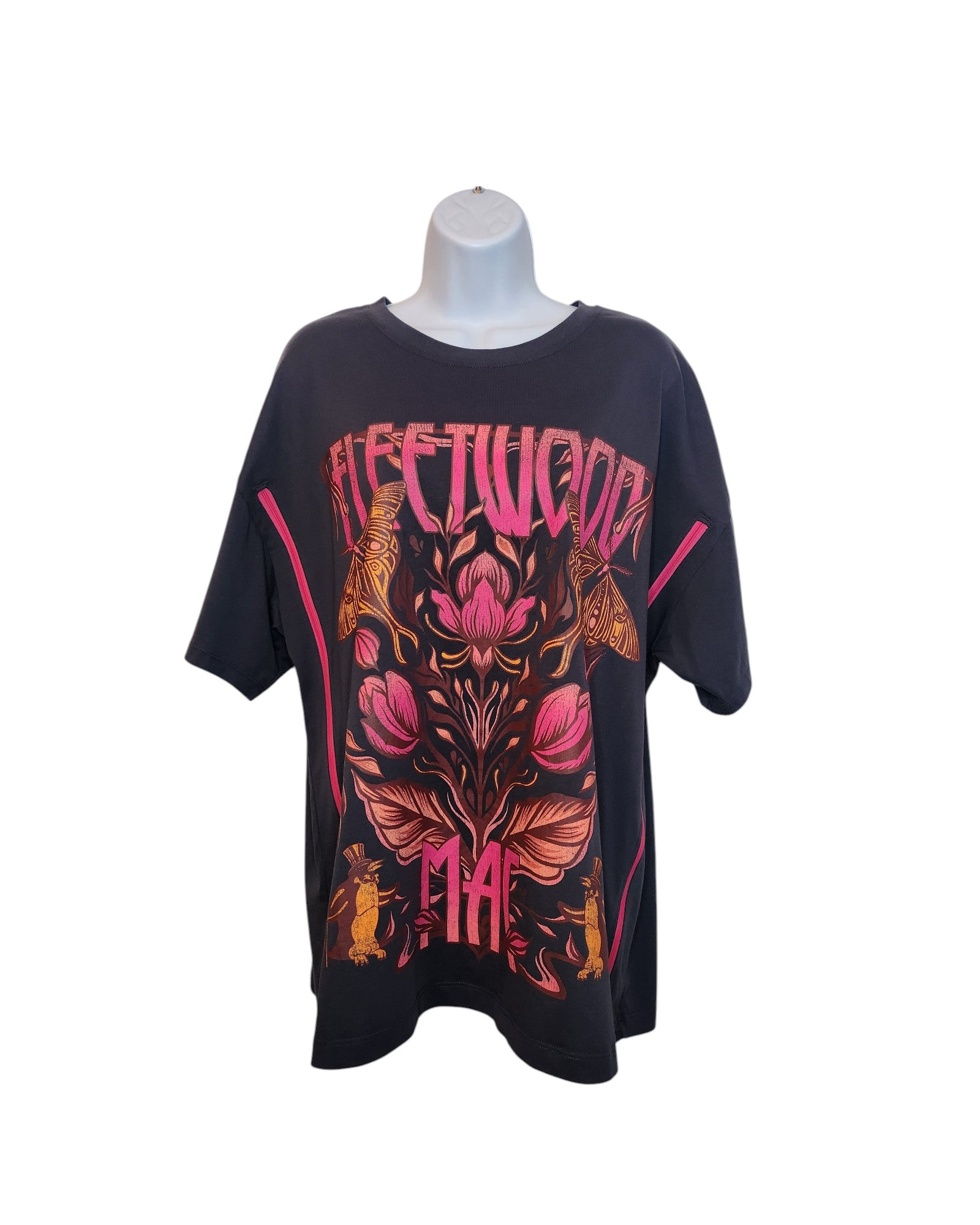 Displayed on a mannequin, this Upcycled Primark grey Fleetwood Mac floral band t-shirt (size L/UK14/16) features breastfeeding & pumping access, colorful floral graphics, and two small rabbits near the bottom. Made from preloved clothing.