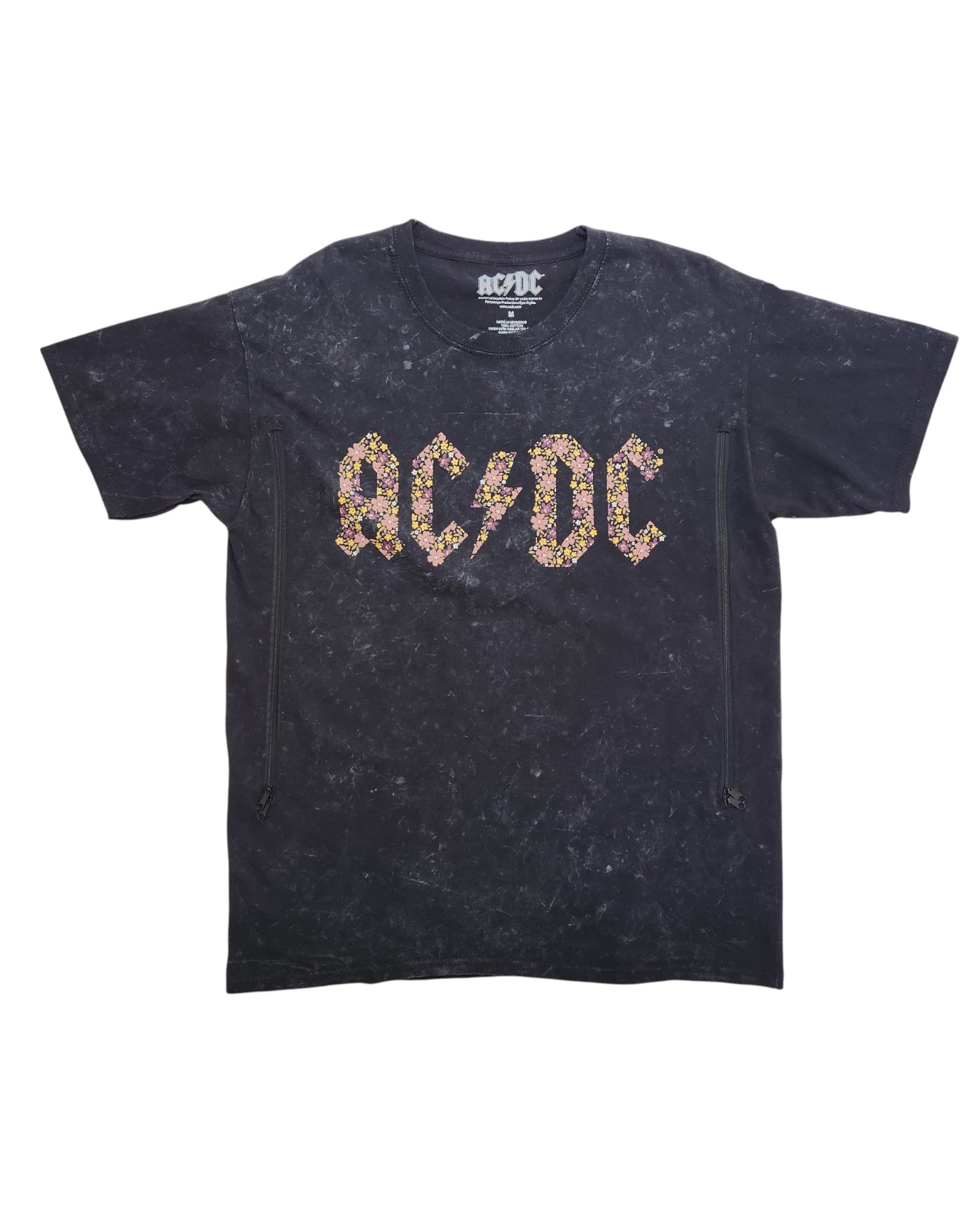 This upcycled black AC/DC T-shirt (size M) features floral “AC/DC” lettering, short sleeves, acid-wash finish, and two vertical zippers for easy breastfeeding or pumping—a unique piece for fans of preloved clothing.