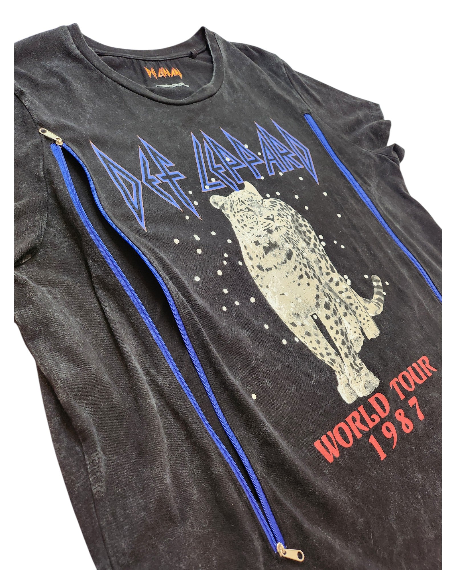 Upcycled Def Leppard Nursing & Pumping Band T-shirt (size L): Black with white leopard graphic, blue logo, red WORLD TOUR 1987 text, and two vertical blue zippers—perfect for preloved fashion fans.