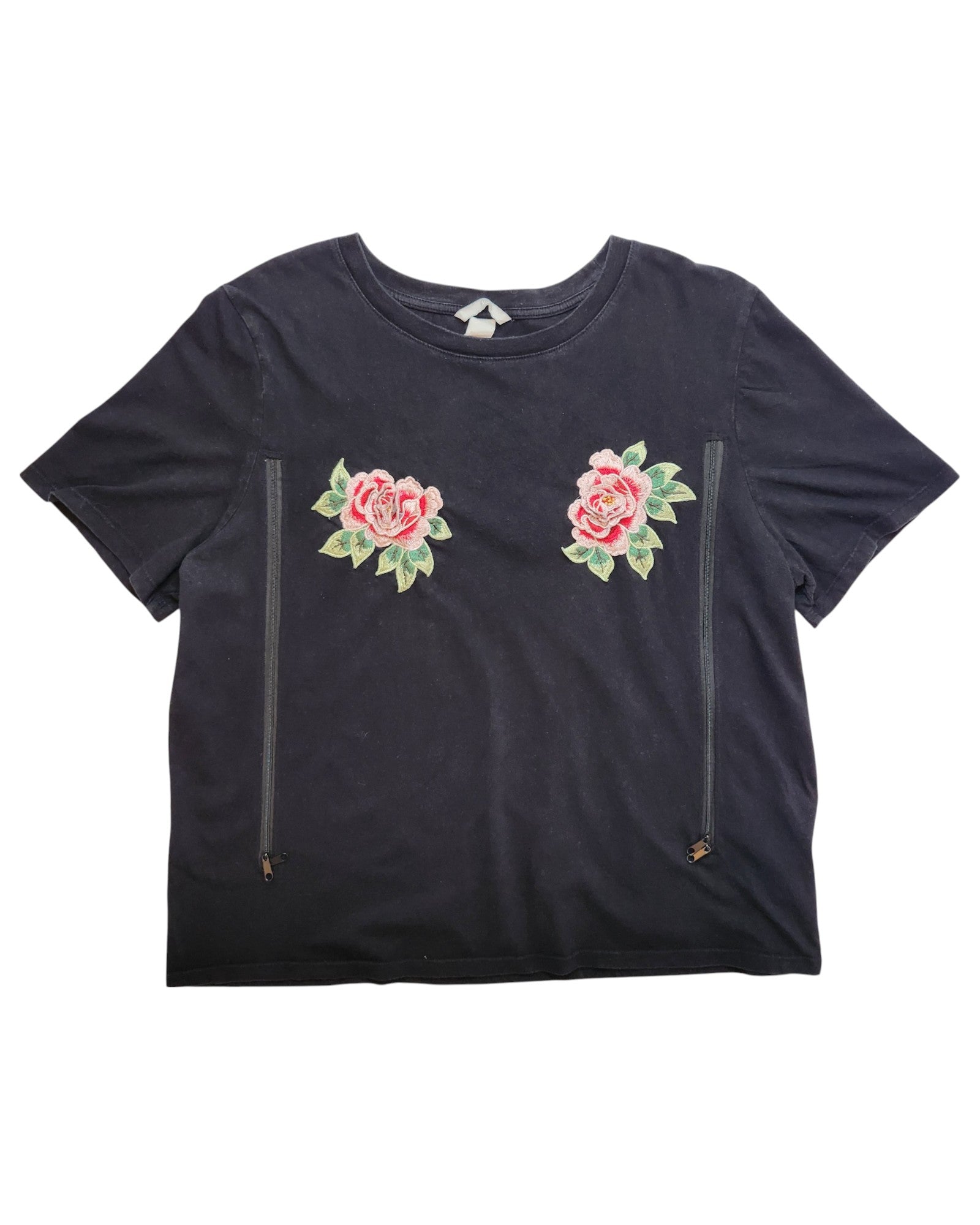 The H&M Upcycled Breastfeeding & Pumping Black Floral Embroidered Flowers t-shirt (L) features pink roses, green leaves, and vertical chest zippers—perfect for nursing, pumping, or adding unique preloved style to your wardrobe.
