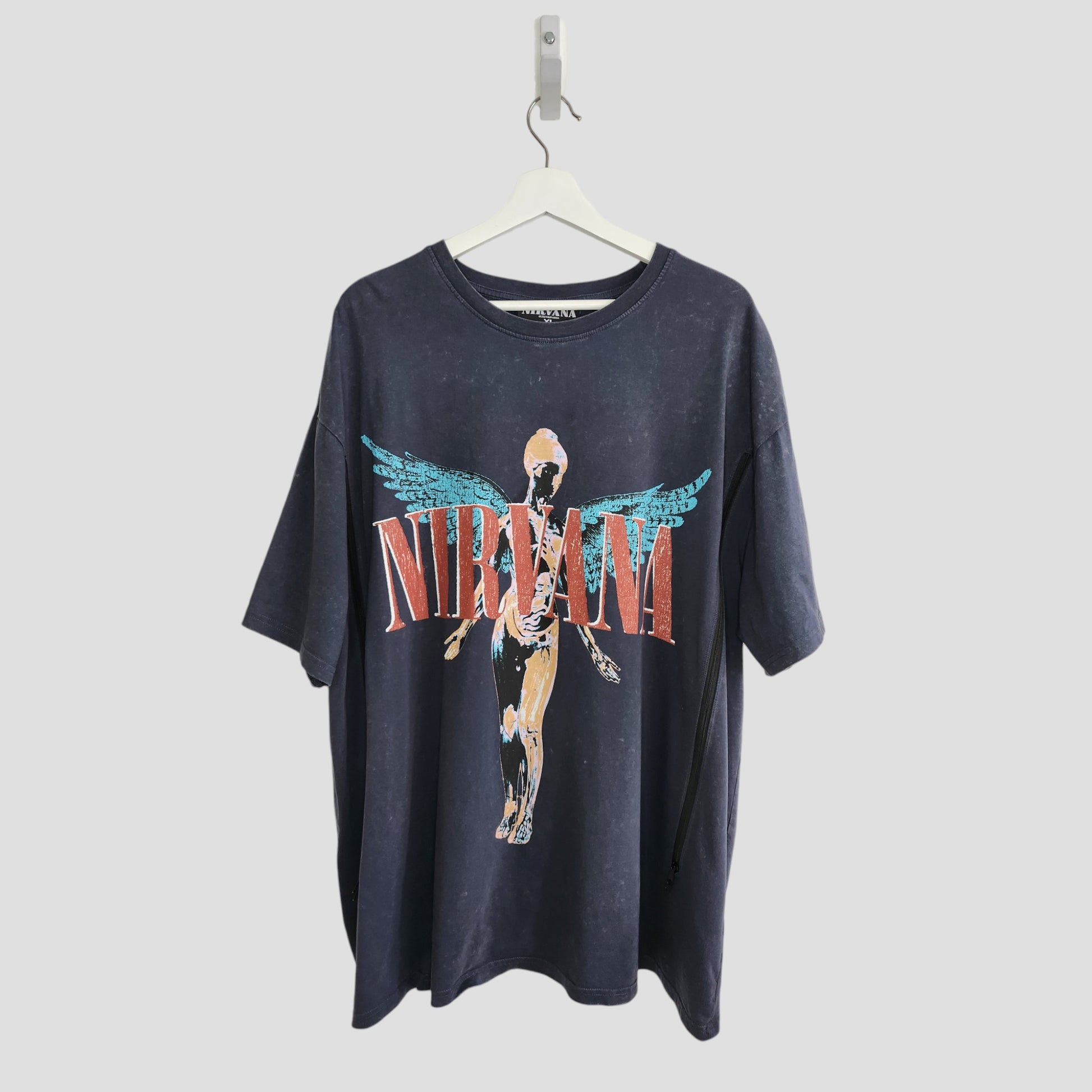 An upcycled Primark Nirvana Angel Band t-shirt in grey/turquoise (XL, UK18/20), perfect for breastfeeding and pumping—unique preloved clothing for your collection.