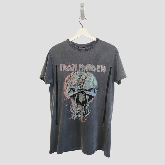 A black Primark upcycled Iron Maiden nursing & pumping t-shirt (UK10, 100234) hangs on a white hanger, showcasing a bold skull graphic and the band’s name—perfect eco-conscious fan wear.