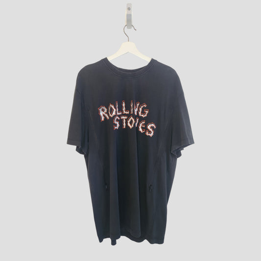 A Primark Upcycled Breastfeeding & Pumping Black Voodoo The Rolling Stones Band T-shirt (XL, 100269) in black, made from repurposed nursing wear, hangs on a white hanger against a plain light background.