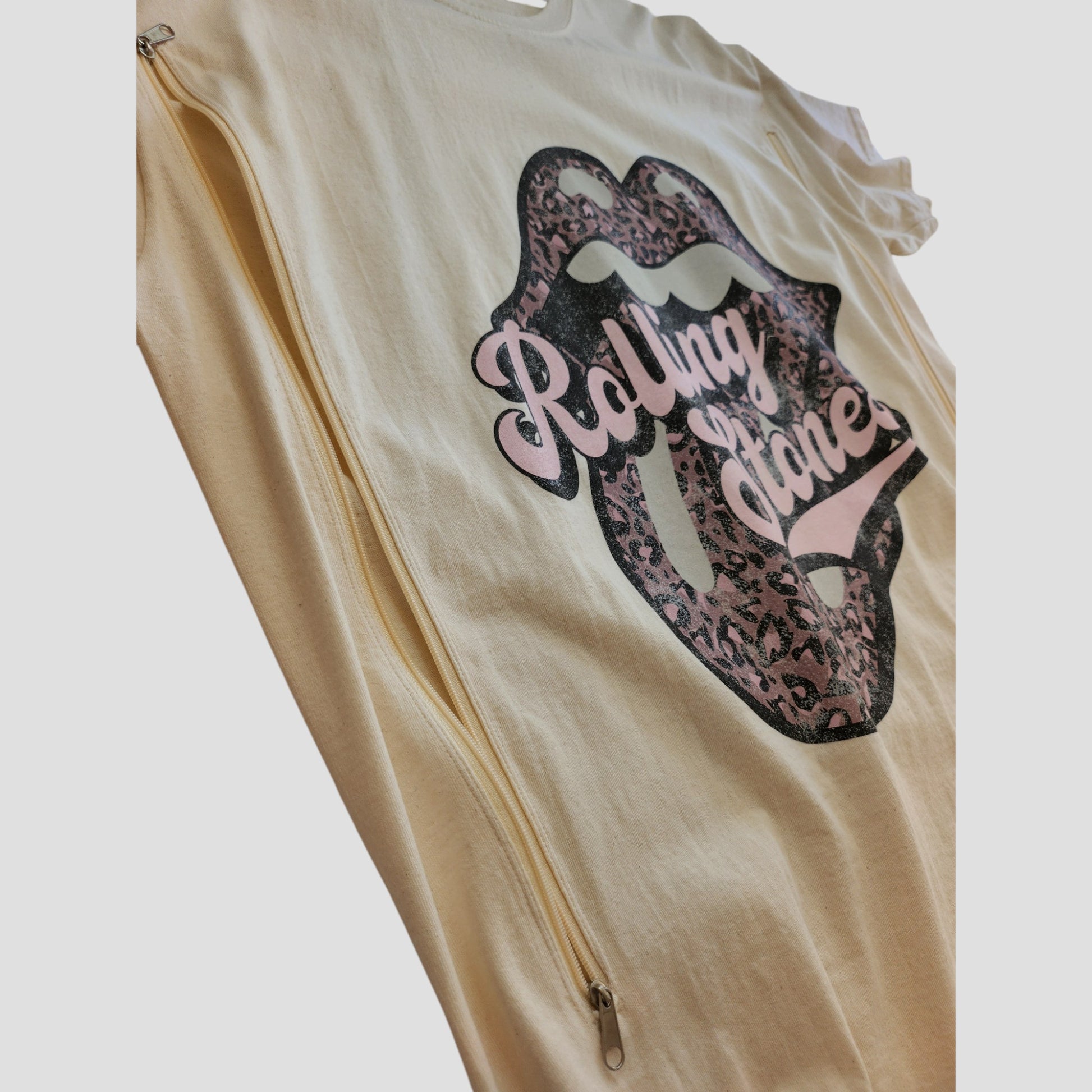 The Rolling Stones Upcycled Breastfeeding & Pumping Cream/Pink Band T-shirt (XL, 100272) combines eco-friendly nursing access with iconic lips logo—perfect for stylish, rock-inspired moms.