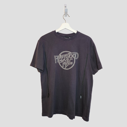 A Primark Upcycled Breastfeeding & Pumping Fleetwood Mac black/white T-shirt (L, UK14/16, 100292) hangs on a white hanger against a plain light background.