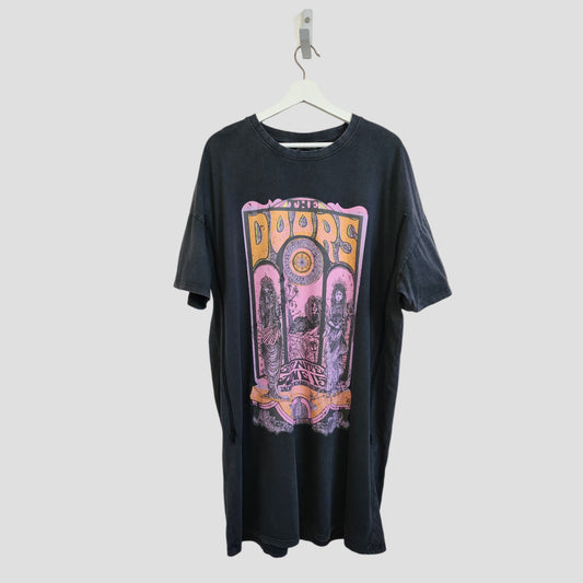 The Primark Upcycled Breastfeeding & Pumping The Doors Band Oversized T-shirt Dress (M, UK12/14) features a colorful purple, yellow, and orange band logo graphic—crafted sustainably from preloved nursing wear.