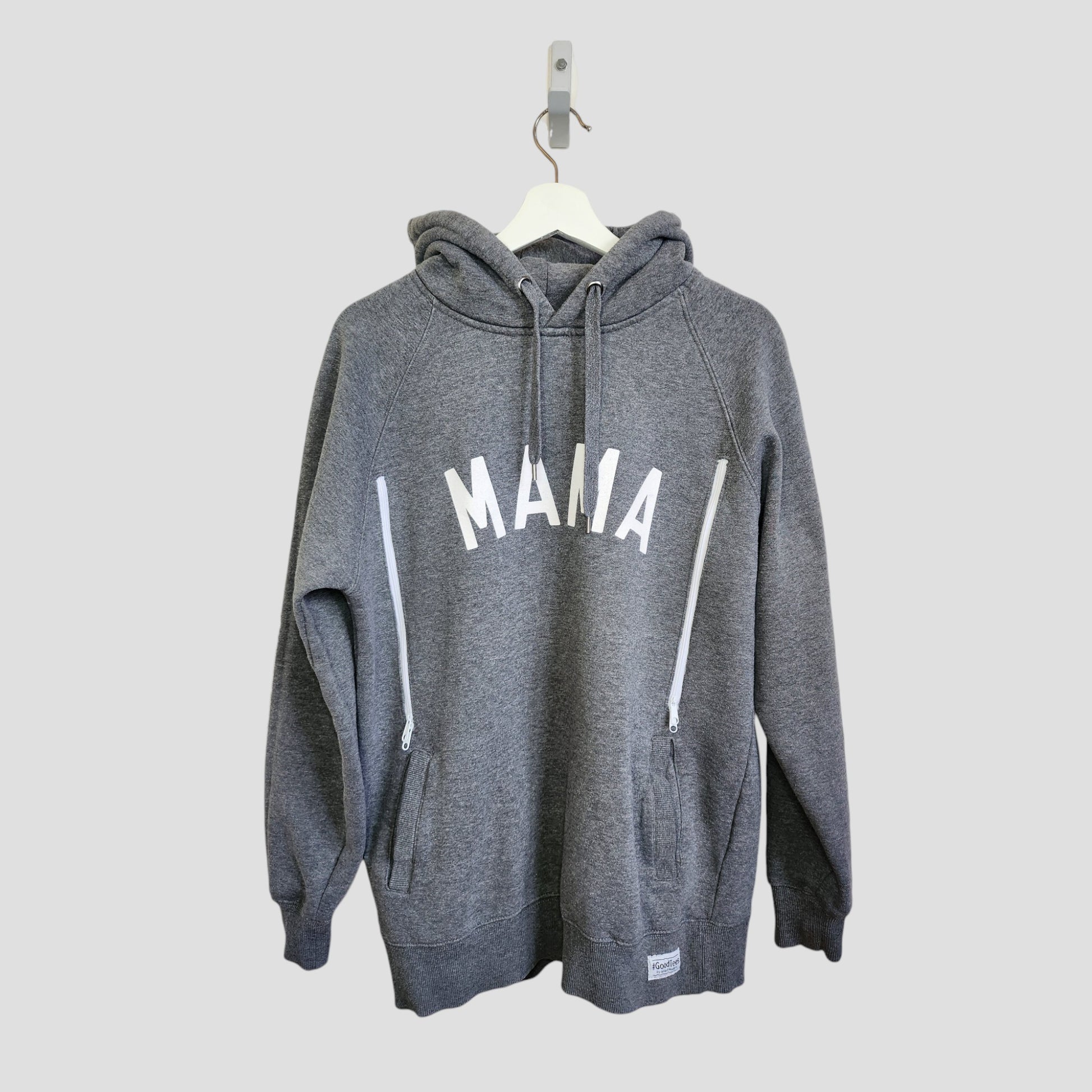 The Selfish Mother Upcycled Breastfeeding & Pumping MAMA Hoodie L (100130) features "MAMA" in white capitals on gray, crafted from upcycled materials, and is shown on a white hanger against a light gray background.