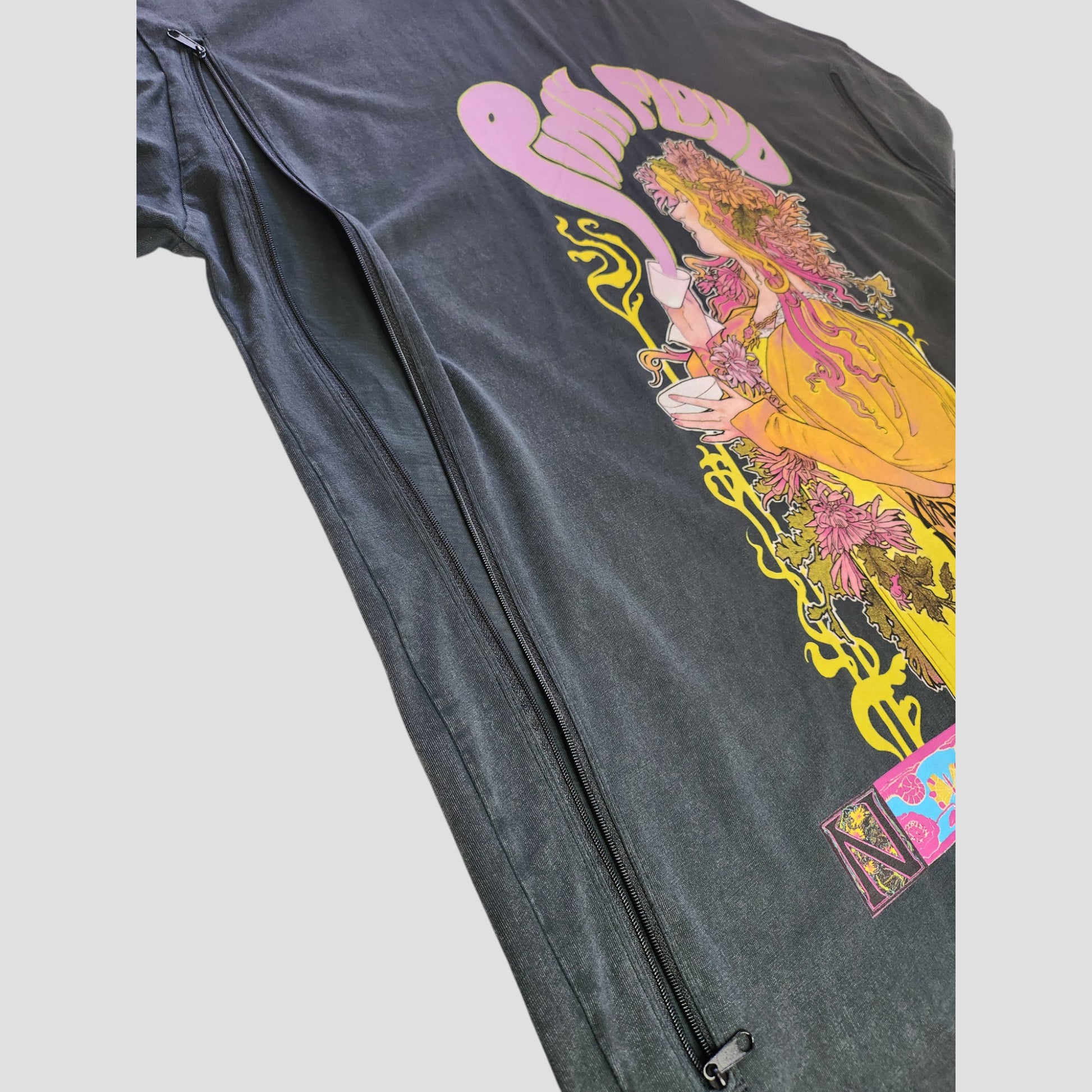 Primark Upcycled Breastfeeding & Pumping Grey Pink Floyd Band Oversized t-shirt dress (M, UK12/14) features psychedelic woman artwork with flowers/vines and long side zippers for nursing. Background is light gray.