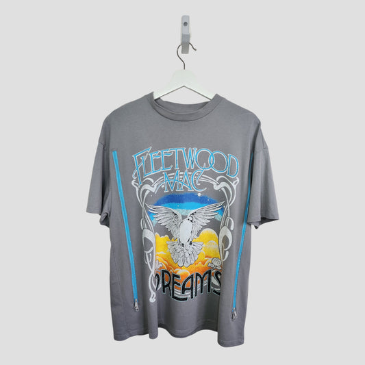 The Upcycled Breastfeeding & Pumping Fleetwood Mac Dreams Band t-shirt by H&M features a gray tee with “Fleetwood Mac Dreams” text and a bird graphic—ideal for eco-friendly maternity or stylish upcycled nursing wear.