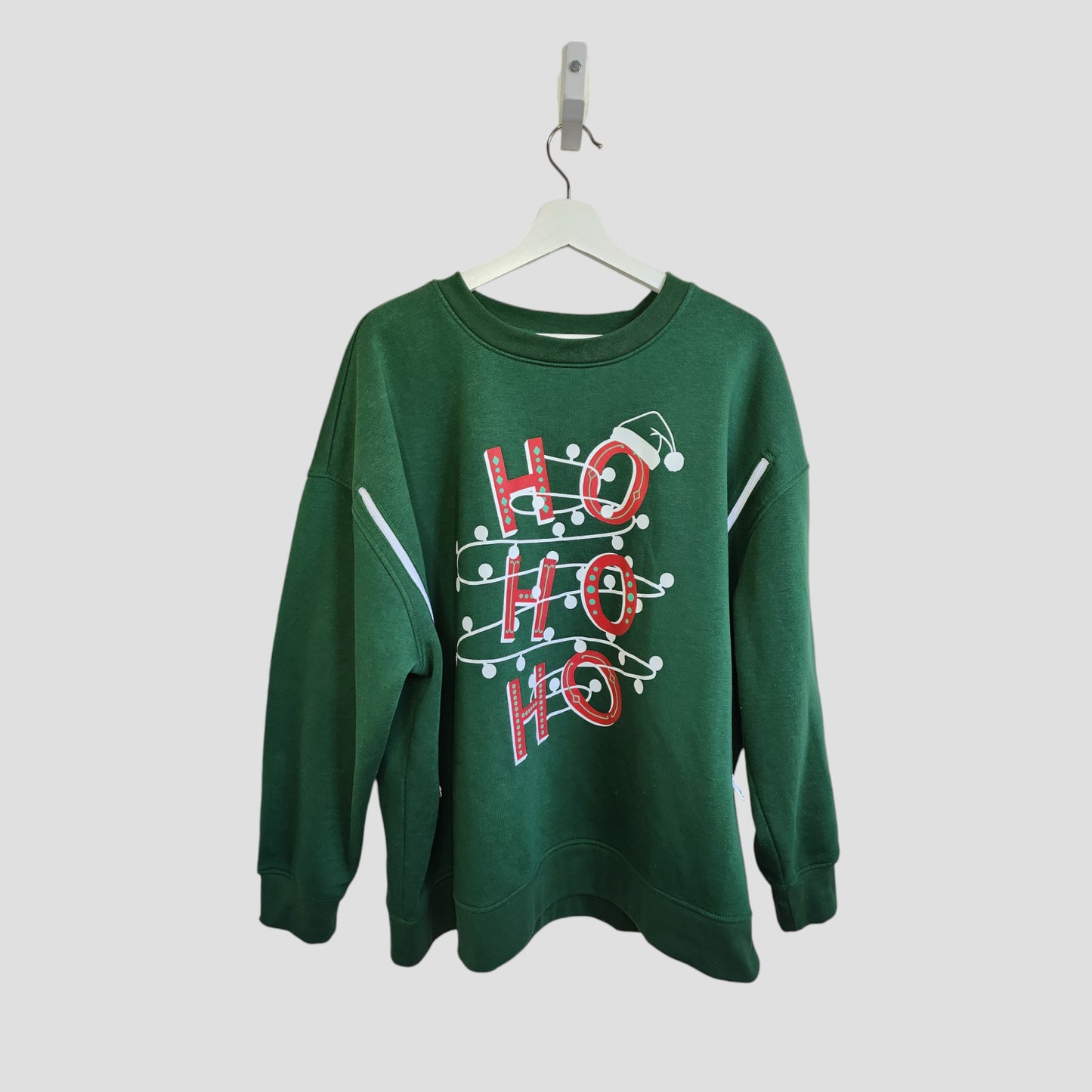 The Primark Upcycled Breastfeeding & Pumping Green HOHOHO Christmas Lights Sweatshirt 2XL features red and white candy cane HO HO HO letters, a string of Christmas lights, and a Santa hat on the top H.