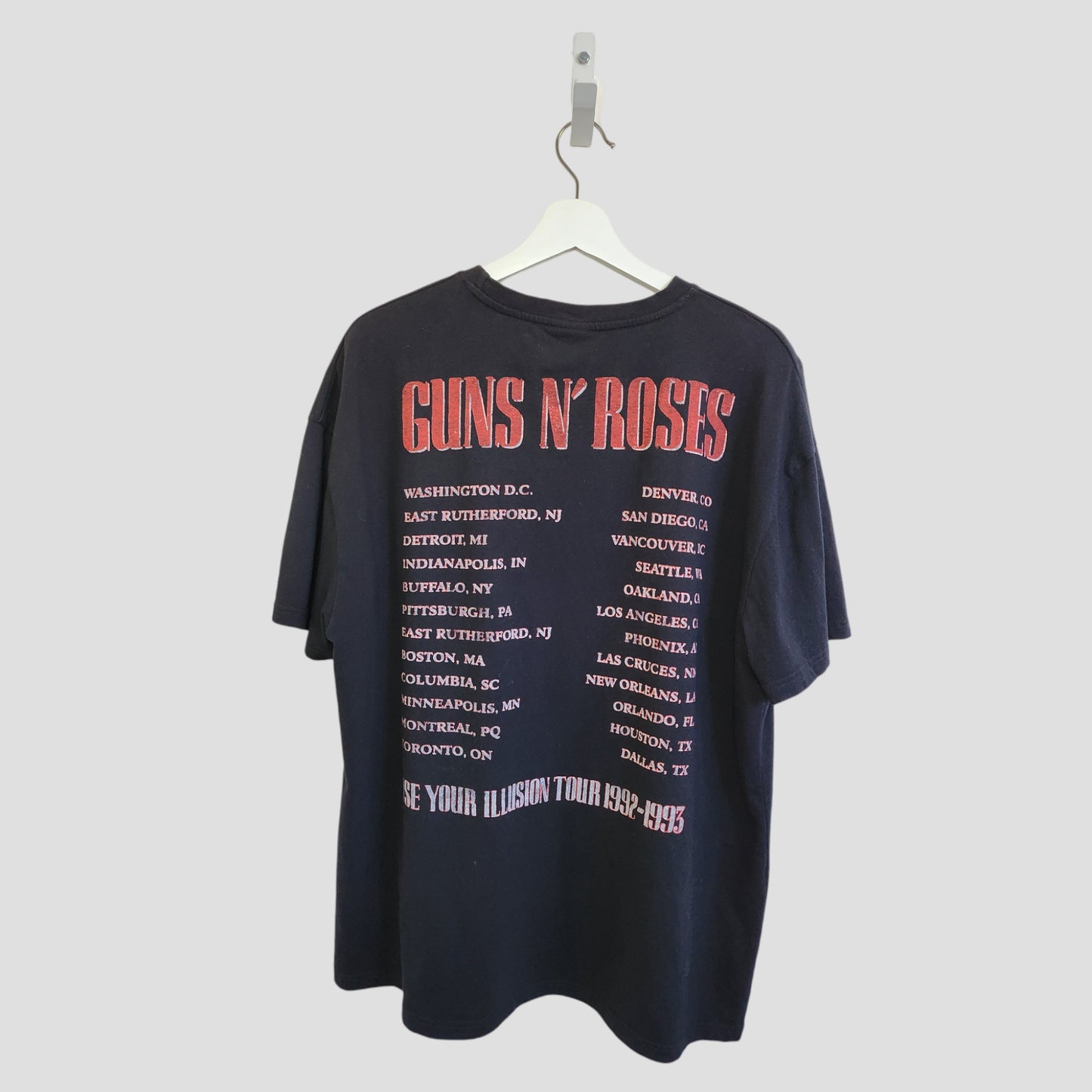 A black Primark Guns N' Roses band t-shirt (L, UK14/16) is upcycled for breastfeeding and pumping, featuring red and white US and Canada city text with "Use Your Illusion Tour 1992-1993" at the bottom.