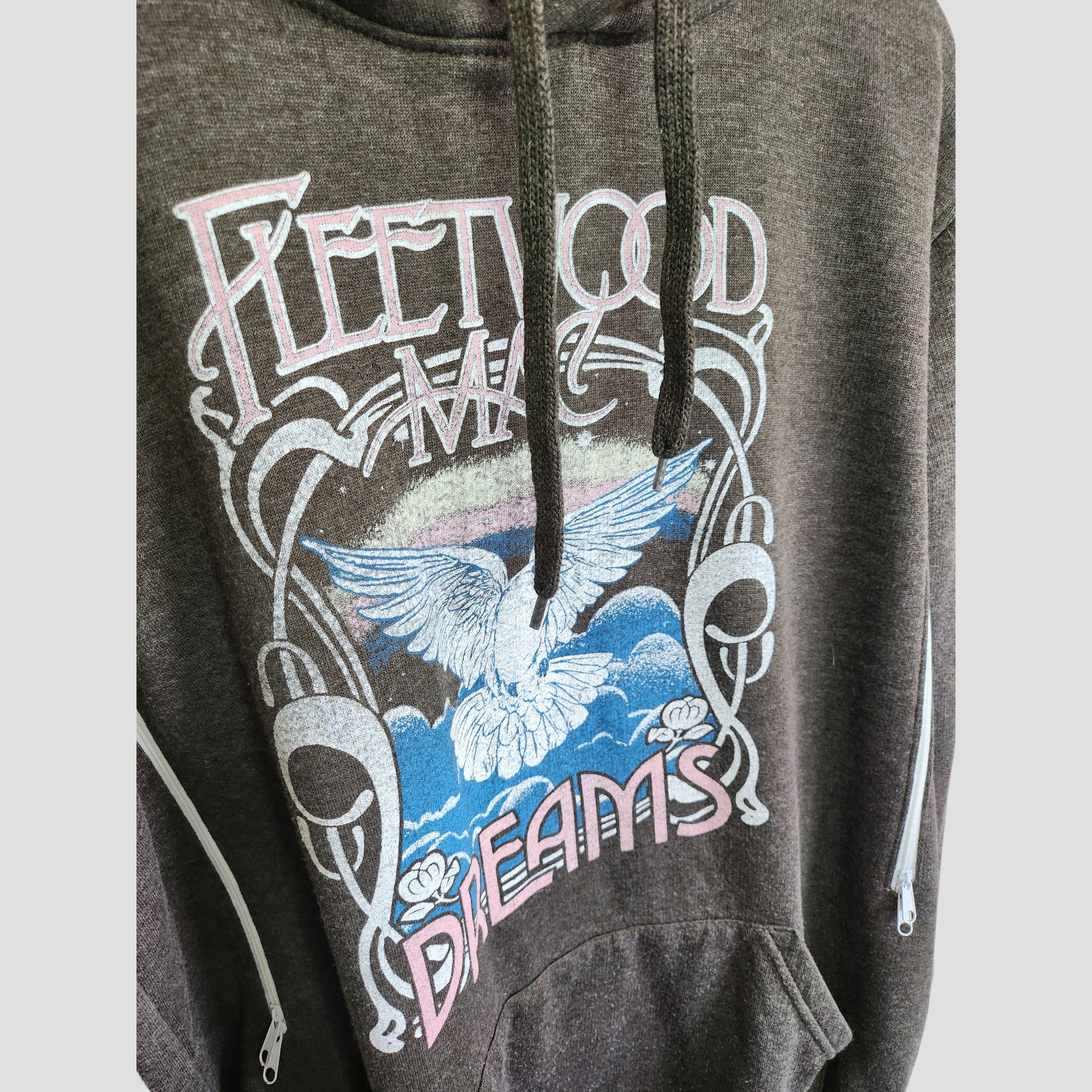 The Upcycled Breastfeeding & Pumping Grey Fleetwood Mac Dreams Band Hoodie UK12/14 features a colorful Dreams graphic with a white bird over blue clouds and pastel accents—crafted from eco-friendly materials by Fleetwood Mac.
