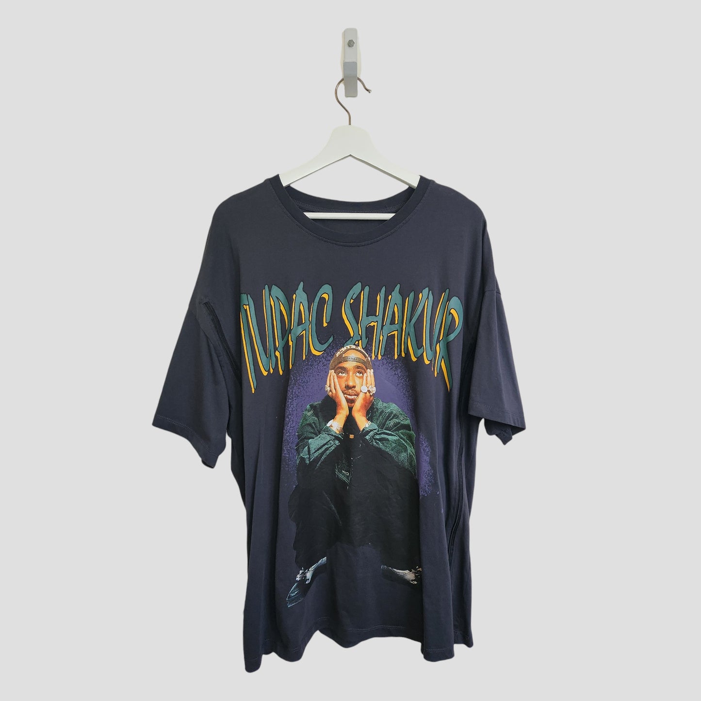 This black Primark Upcycled Breastfeeding & Pumping Tupac t-shirt (L, UK16/18) features a photo of a man seated with his hands by his face and bold "Tupac Shakur" text above—a stylish, functional choice for nursing moms.