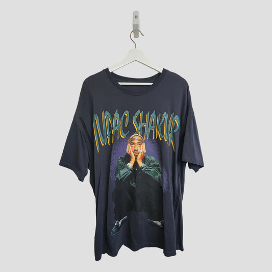 This black Primark Upcycled Breastfeeding & Pumping Tupac t-shirt (L, UK16/18) features a photo of a man seated with his hands by his face and bold "Tupac Shakur" text above—a stylish, functional choice for nursing moms.