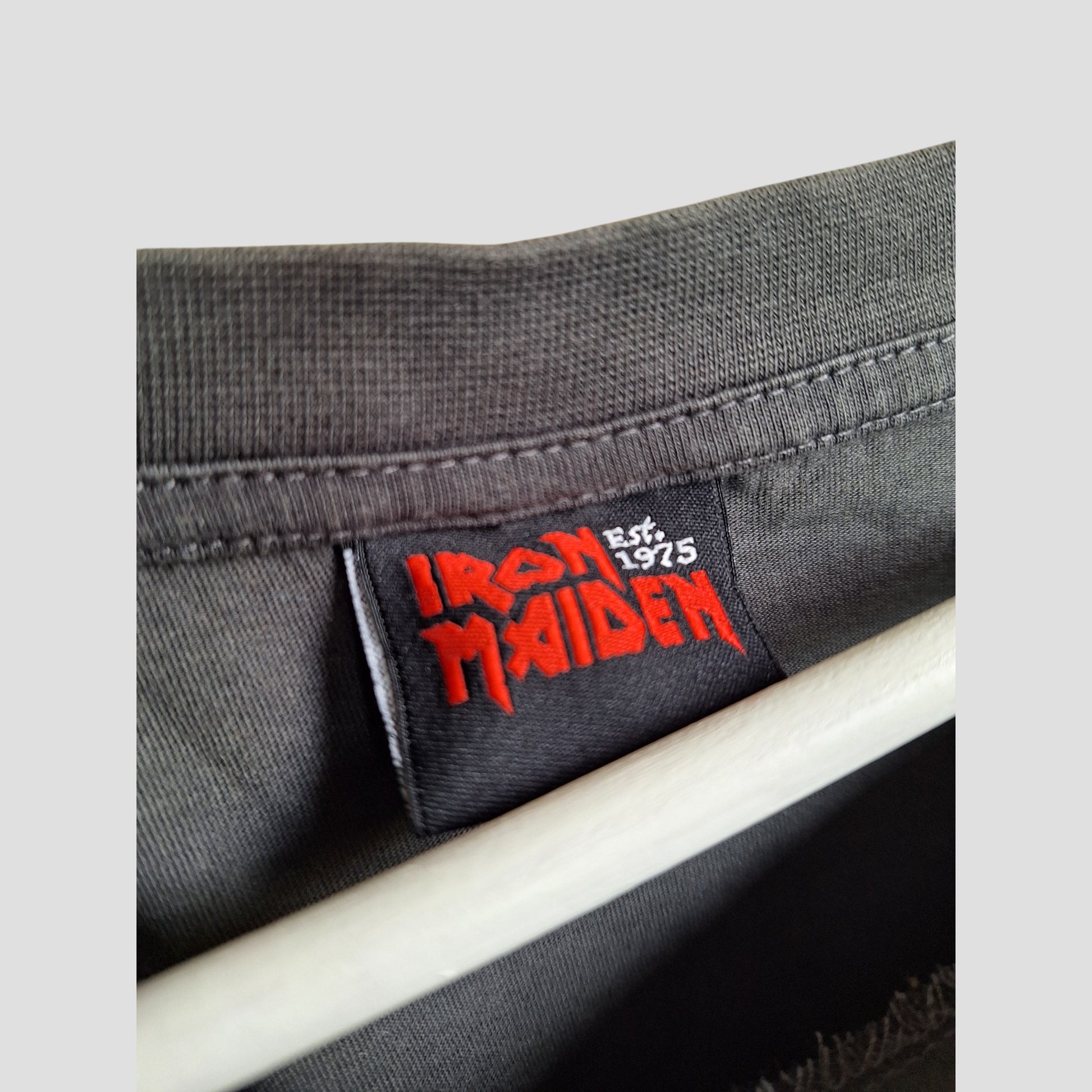 The George Upcycled Breastfeeding & Pumping Grey/Red Glitter Iron Maiden Band t-shirt UK18 (100400) offers modern moms an eco-friendly nursing wear option with a unique, repurposed band tee style.