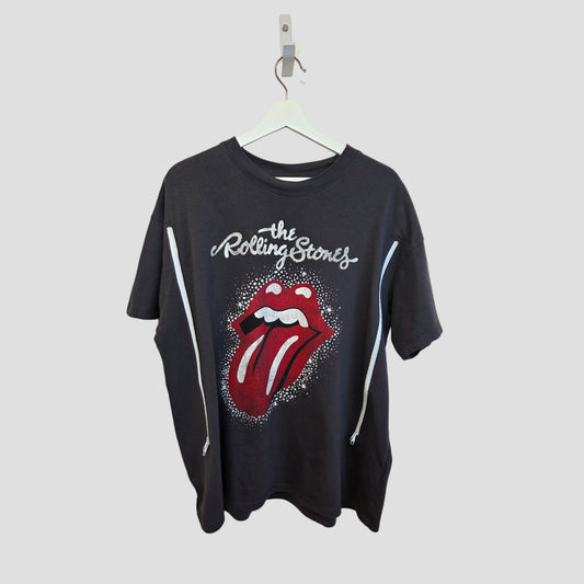 A grey and red Upcycled Breastfeeding & Pumping Rolling Stones Band t-shirt (L) by H&M features white stars and the iconic band logo with a red tongue, shown on a hanger against a plain gray background.