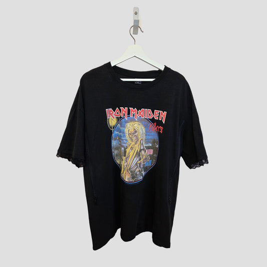 The Primark Upcycled Breastfeeding & Pumping Black Iron Maiden Oversized Band T-shirt (M, 100417) features the Killers album cover and offers a metal-inspired nursing option for moms. Shown on a white hanger against a light gray background.