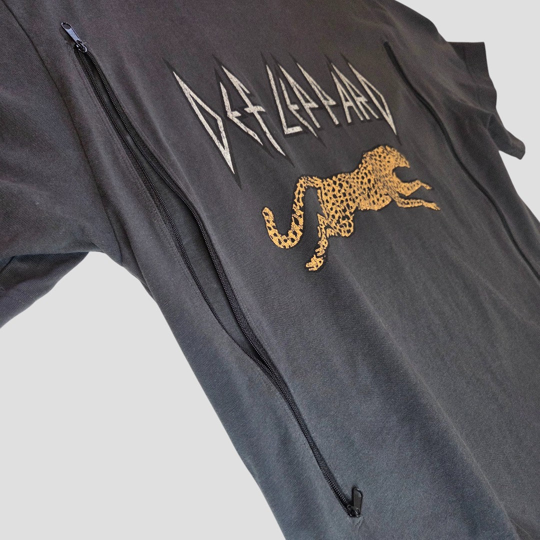 An upcycled H&M grey Def Leppard leopard band T-shirt (size S, #100474) designed for breastfeeding and pumping, shown laid flat on a light background.