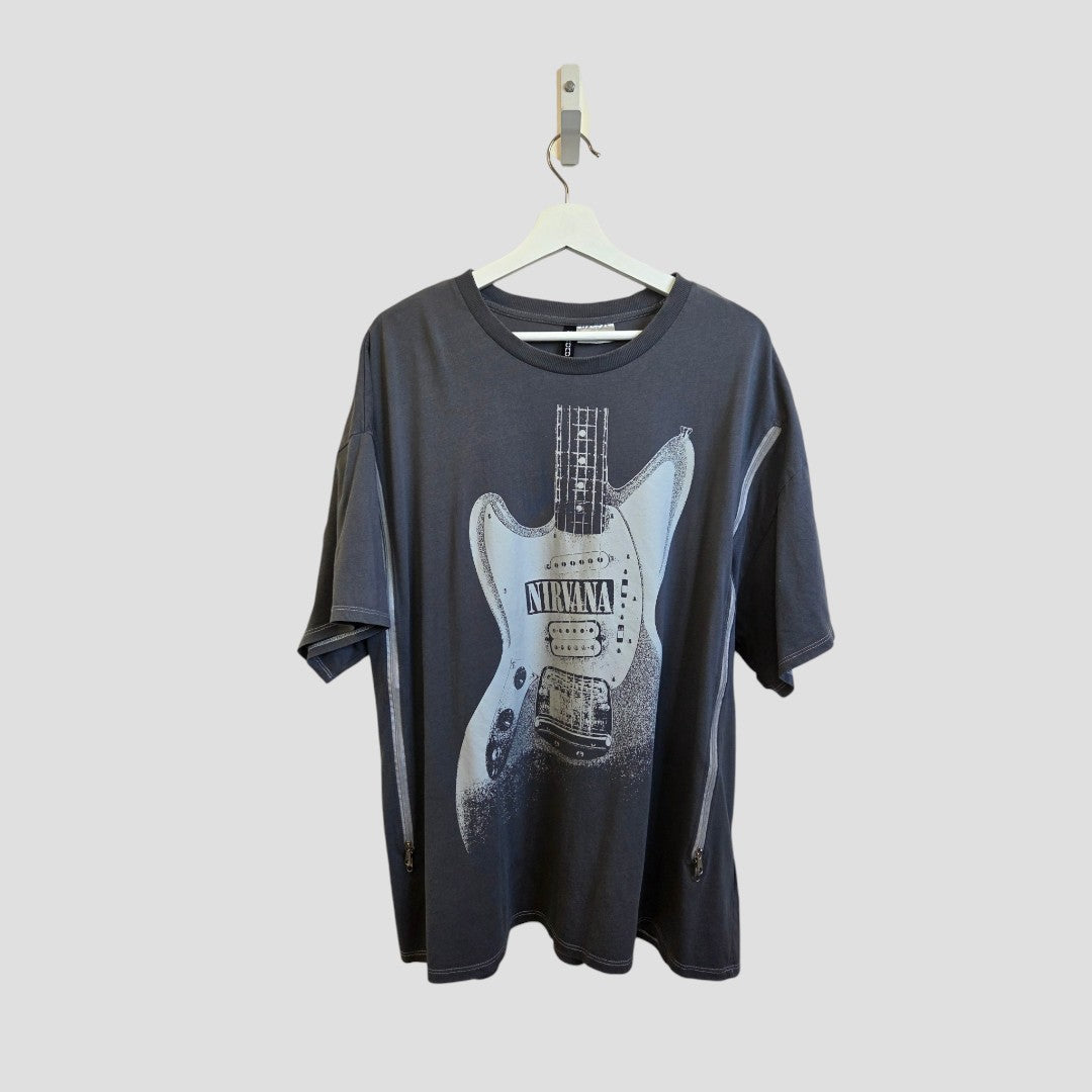 An affordable dark gray upcycled H&M Nirvana Guitar Band nursing & pumping T-shirt (L, 100371) hangs on a white hanger against a plain light gray background.
