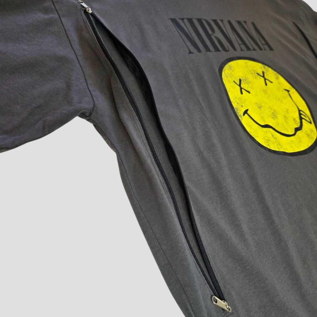 The Primark Upcycled Breastfeeding & Pumping Nirvana Yellow Smile Band T-shirt (M, UK12/14) is a dark gray tee with a yellow smiley face logo and long diagonal zipper for easy nursing, shown laid flat on a light background.