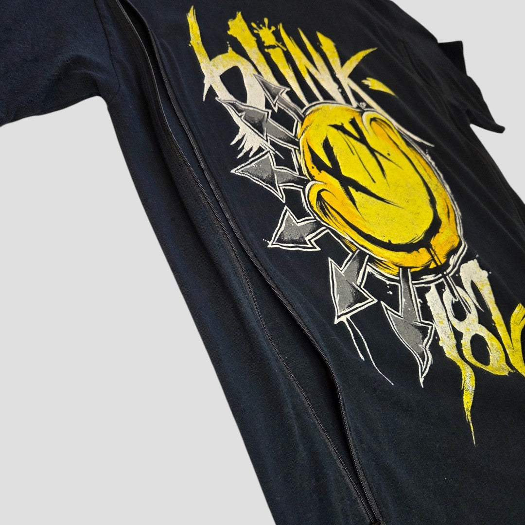 The Gildan Upcycled Breastfeeding & Pumping Blink 182 Yellow Smile Band t-shirt (L, 100250) features a bold yellow smiley face and distressed Blink 182 text—an affordable and stylish nursing wear option.