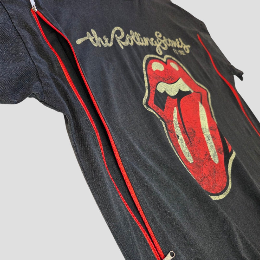 This upcycled Primark Rolling Stones band t-shirt dress (UK12/14) is eco-friendly breastfeeding clothing with two discreet red-zippered openings, featuring the iconic red tongue logo on black. Background: plain gray.