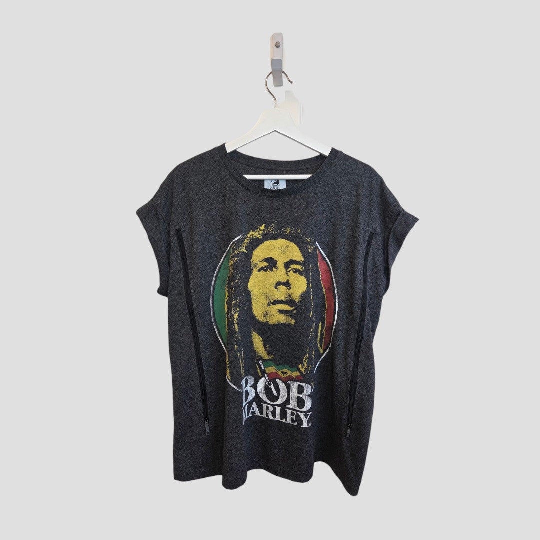 An affordable, dark gray Primark Upcycled Breastfeeding & Pumping Bob Marley Band t-shirt (UK20), on a hanger, features Bob Marley's face in a red, yellow, and green circle with “BOB MARLEY” in white underneath.
