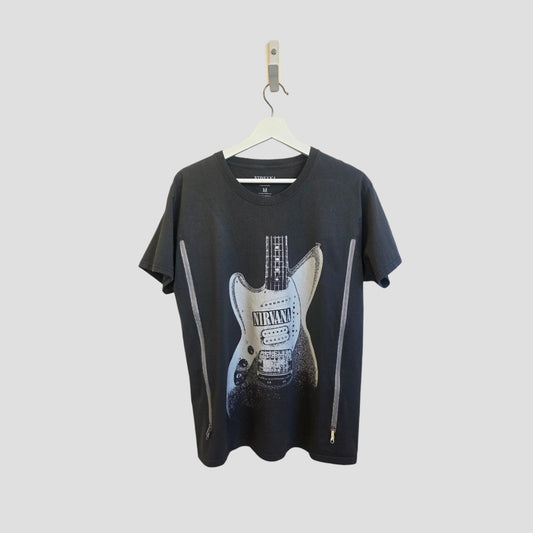 The Nirvana Upcycled Breastfeeding & Pumping Grey Guitar Band T-shirt (M) features nursing-friendly side zippers and an electric guitar graphic—combining style and function for modern moms.