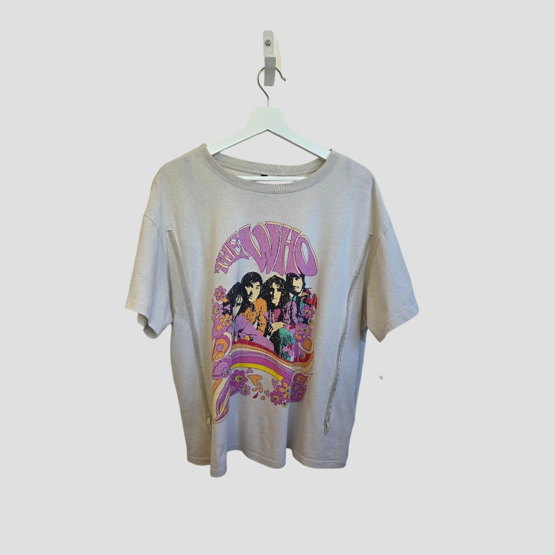 The H&M Upcycled Breastfeeding & Pumping Cream/Pink The Who Band T-shirt (L) features a bold graphic and band name, offering stylish, affordable maternity wear. Shown hanging on a white hanger against a plain background.