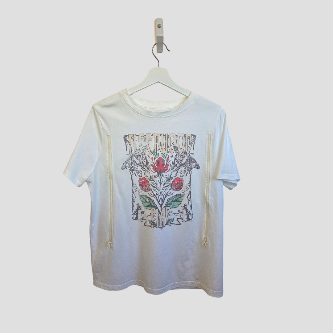 A white Upcycled Tu Breastfeeding & Pumping Cream Fleetwood Mac Band T-shirt UK14, featuring colorful graphics of roses, leaves, and mushrooms on the front—crafted from eco-friendly materials.
