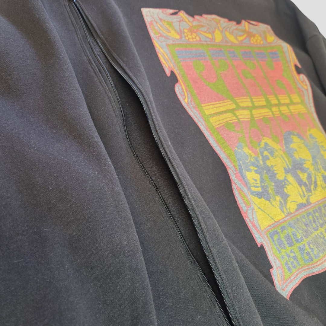 A close-up of a Primark Upcycled Breastfeeding & Pumping Black Pink Floyd Band Sweatshirt (M, UK12/14) featuring a vibrant graphic—an affordable, stylish nursing wear option for breastfeeding or pumping.