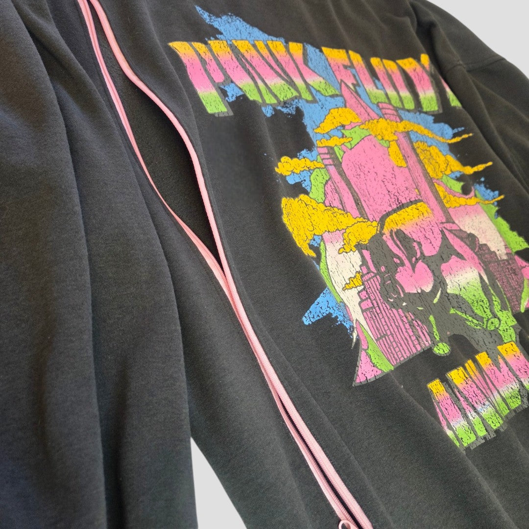 An affordable grey H&M upcycled breastfeeding & pumping Pink Floyd band sweatshirt (L, 100440) with a colorful retro-style graphic and pink zipper, laid flat on a white surface.