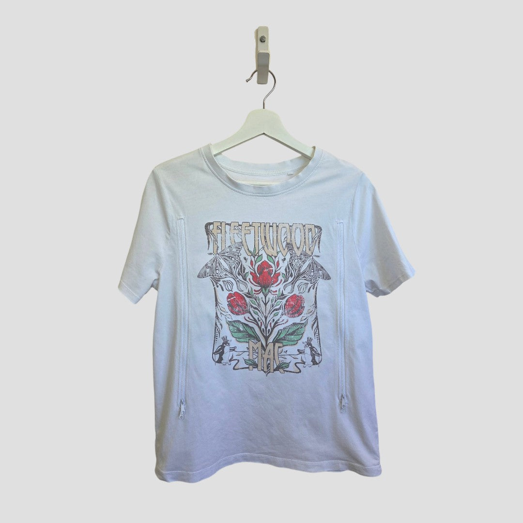 Upcycled Tu Nursing & Pumping White Fleetwood Mac Floral Band t-shirt UK12 (100434), made from soft eco cotton, hangs on a plain light grey background with a colorful red rose graphic and "Fleetwood Mac" text across the top.