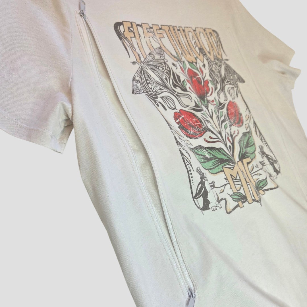 The Tu Upcycled Breastfeeding & Pumping White Fleetwood Mac Floral Band t-shirt (UK12, 100434) features a colorful graphic with florals and butterflies, plus a diagonal zipper for easy nursing access. Eco-friendly and stylish.