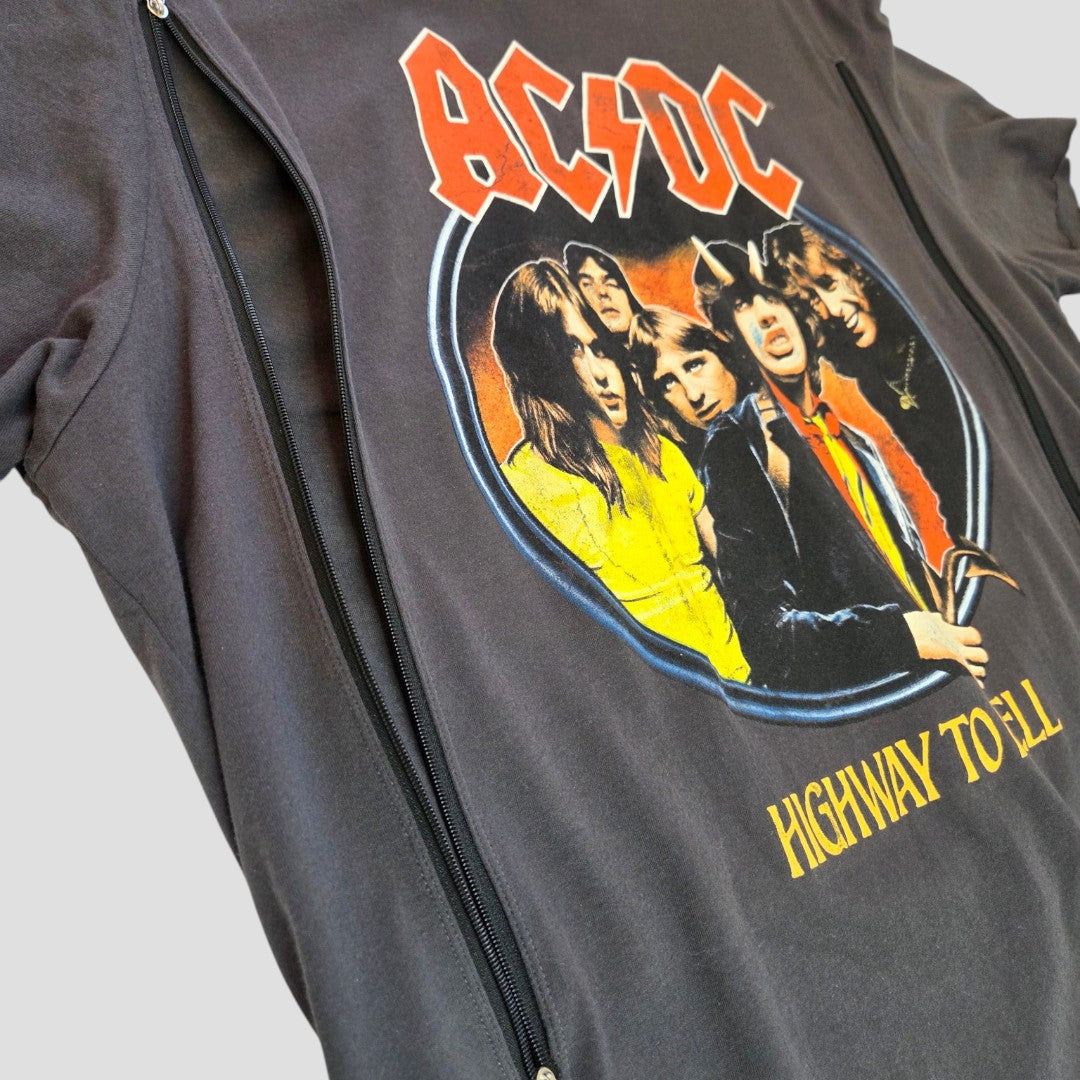 A close-up of the Amplified Upcycled Breastfeeding & Pumping Grey AC/DC Highway Band t-shirt (XL) shows convenient side zippers for nursing access, featuring a band member graphic on this unique and functional top.