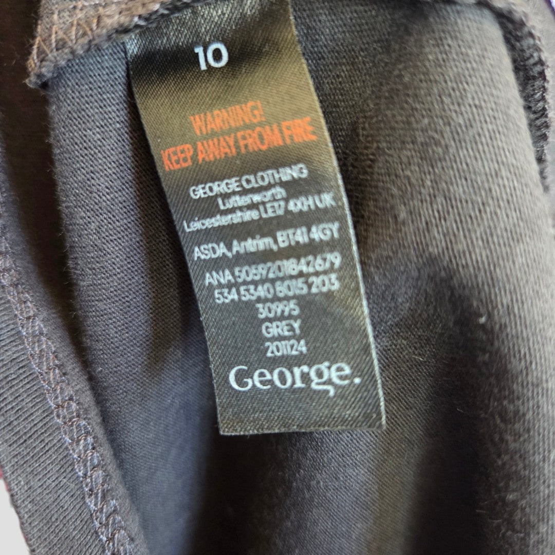 Black clothing label with white and orange text warns to keep away from fire. Tag for the George Upcycled Breastfeeding & Pumping Black Peacock Fleetwood Mac Band t-shirt UK10 (100511), ideal for eco-friendly nursing collections.