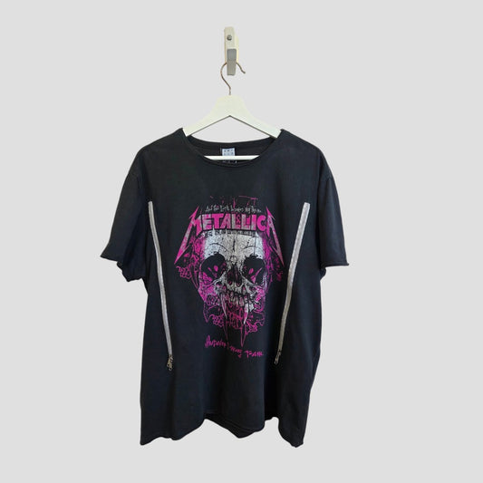 Amplified Upcycled Breastfeeding & Pumping Black/Pink Metallica Band T-shirt XL (100529) features a skull graphic, pink/white text, and two diagonal nursing zippers from shoulders to sides. Displayed on a hanger against a plain background.